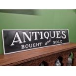 An antiques sign.