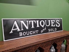 An antiques sign.