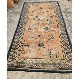 AN ANTIQUE CHINESE RUG 245 x 134 cm.