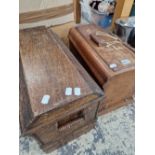 Two vintage sewing machines in wooden cases