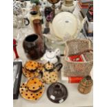 Glass vases, a globe ceiling light, a lazy susan, spotted tea cups, etc/