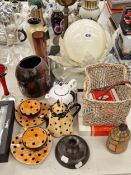 Glass vases, a globe ceiling light, a lazy susan, spotted tea cups, etc/