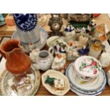 French faience plates and bowls, Staffordshire houses and figures, a clock, etc.