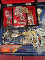 A collection of vintage and later costume jewellery, watches, etc, contained in a jewellery case.