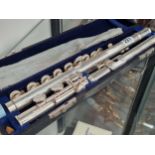 A cased Ducol silvered flute
