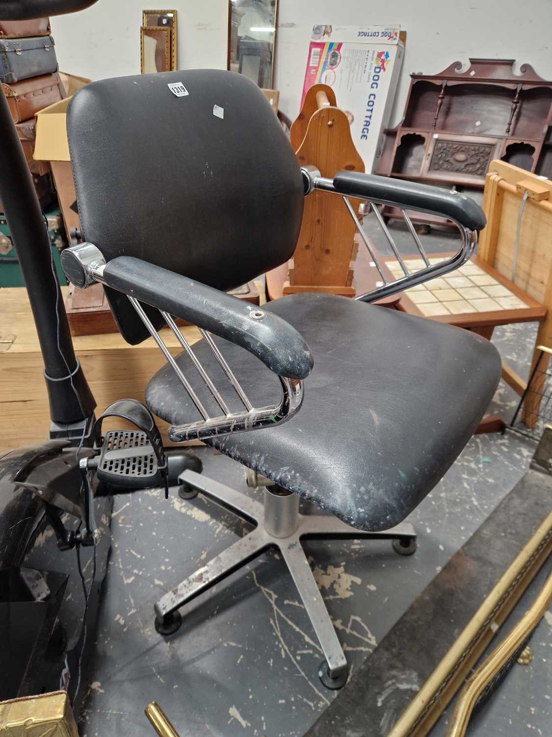 A RETRO SWIVEL DESK CHAIR