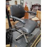 A RETRO SWIVEL DESK CHAIR