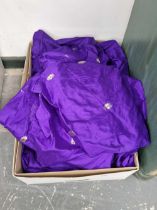 A quantity of purple silk eastern saris.