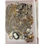 Two trays of various gold plated costume jewellery, a further tray of body jewellery (new old