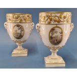 A pair of Derby ram handled vases supported on square feet painted with landscapes by Askew or