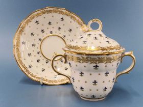 A Derby two handled cup, cover and stand painted with cornflower sprigs, puce mark and pattern