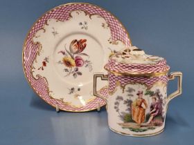 A Derby chocolate cup, cover and saucer painted with a wavy rim band of red chequering, flowers on