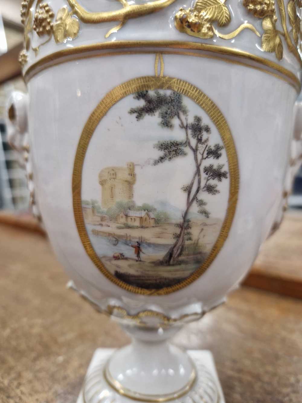 A pair of Derby ram handled vases supported on square feet painted with landscapes by Askew or - Image 14 of 17