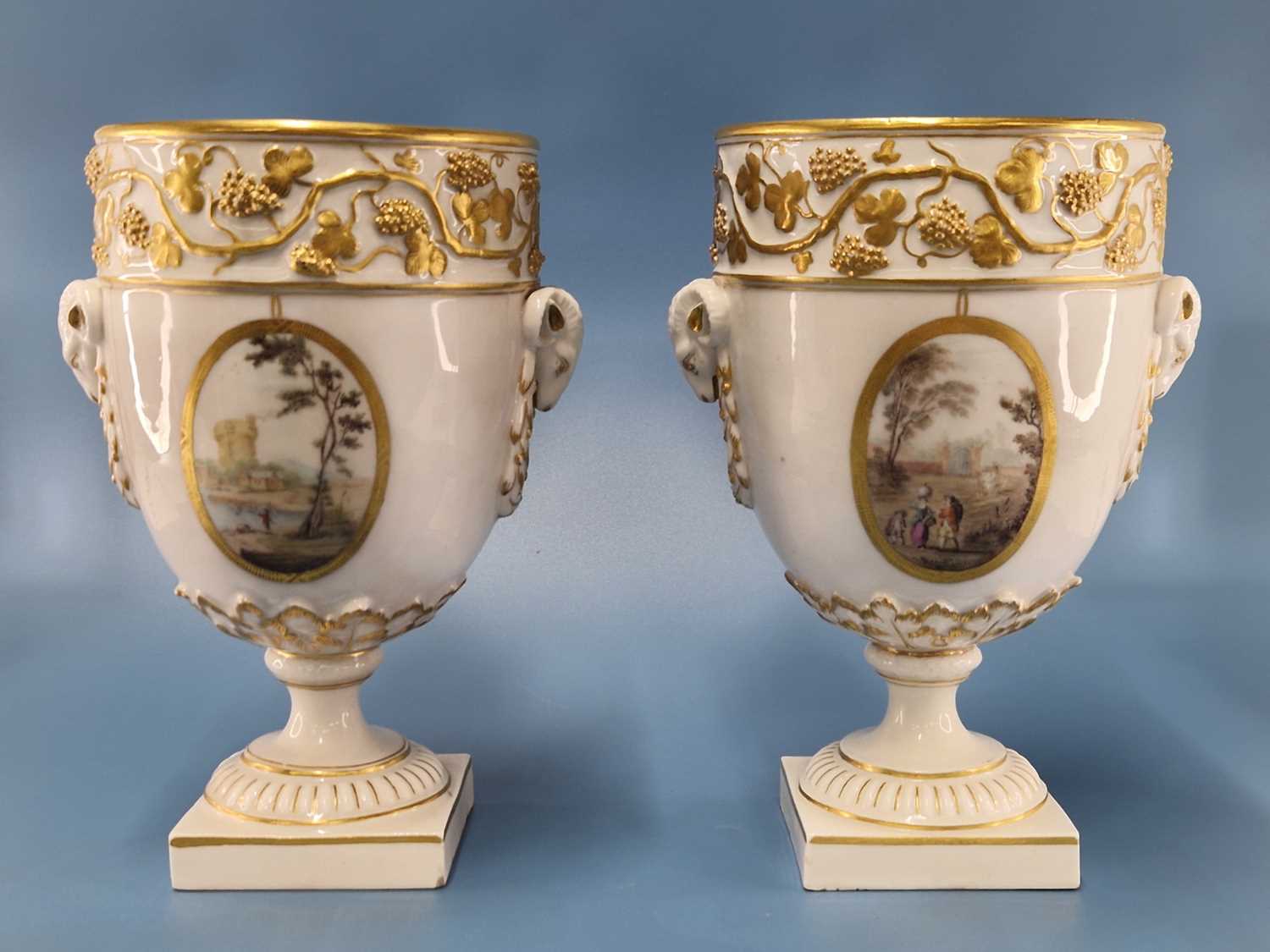 A pair of Derby ram handled vases supported on square feet painted with landscapes by Askew or - Image 3 of 17