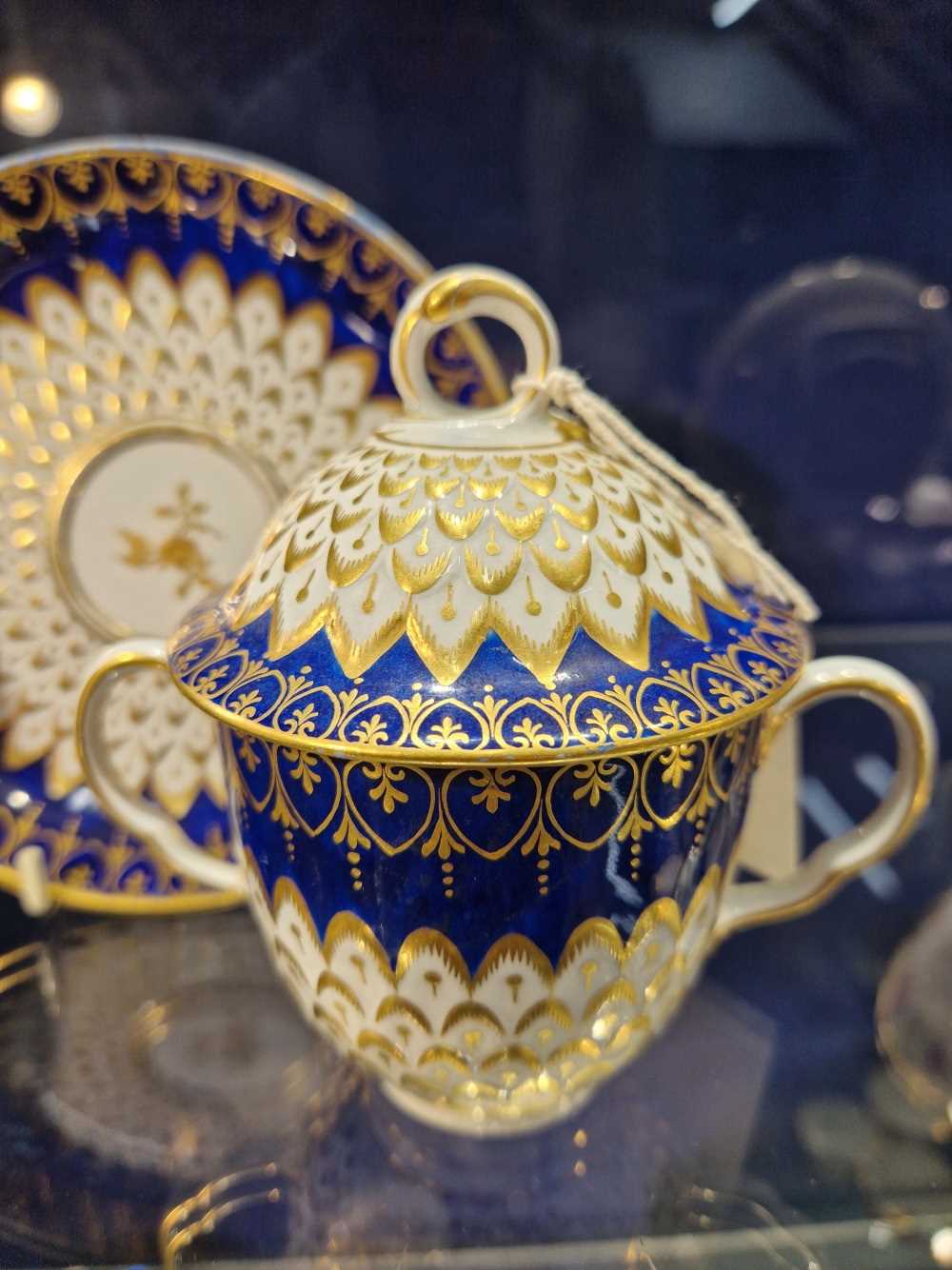 A Derby two handled cup, cover and saucer with royal blue rims enclosing gilt and moulded - Image 3 of 8