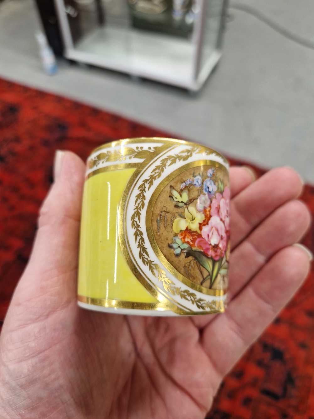 A Derby yellow ground coffee can and saucer, the former painted with a roundel of flowers, puce - Image 12 of 13