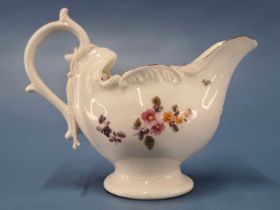 A Derby rococo shaped sauce boat painted with flowers below the red lined rim, RF 129 This has a