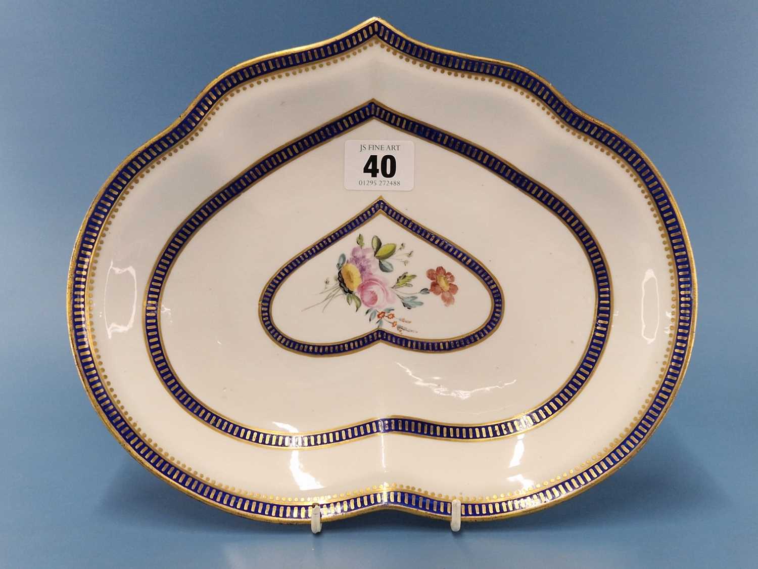 A Derby kidney shaped dish painted in the manner of Edward Withers with three Smiths blue bands of - Image 2 of 2