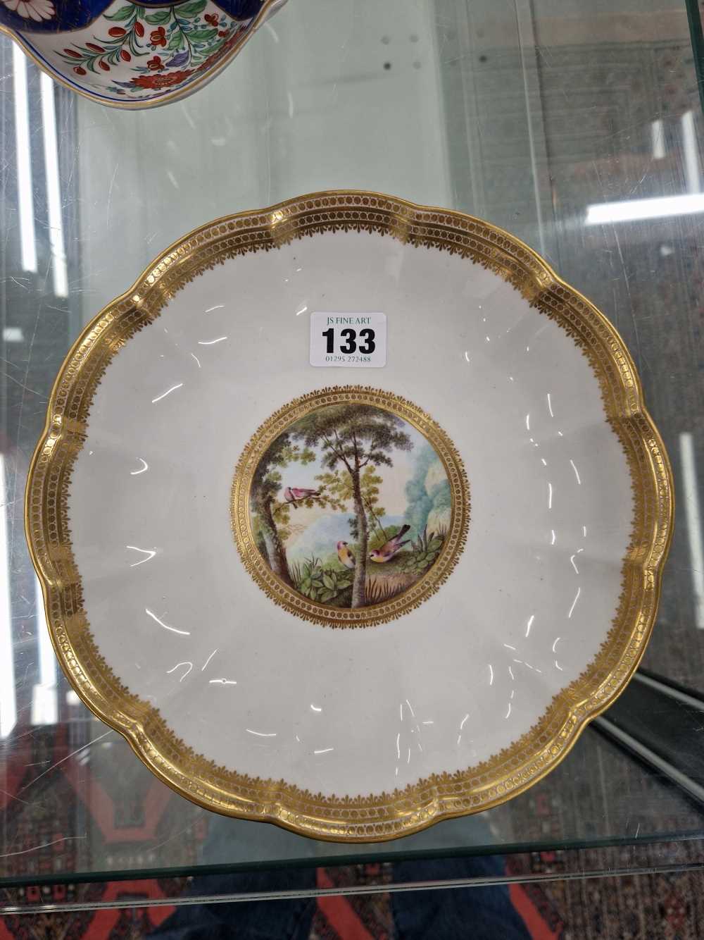 A Derby plate painted by George Robertson with birds in a landscape within a gilt wavy edged rim, - Image 4 of 12