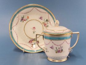 A Derby two handled cup, cover and saucer painted with turquoise bands, mauve husk swags and