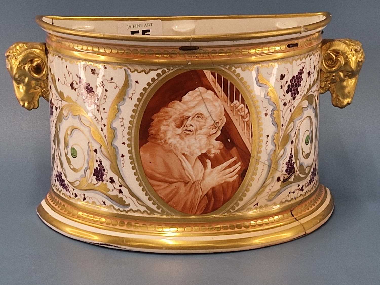 A Derby ram handled bough pot painted with a sepia oval of a man with a harp flanked by grapes and