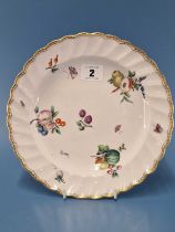 A Chelsea Derby dish with a fluted rim, painted with fruit, butterflies and flowers, gilt mark,