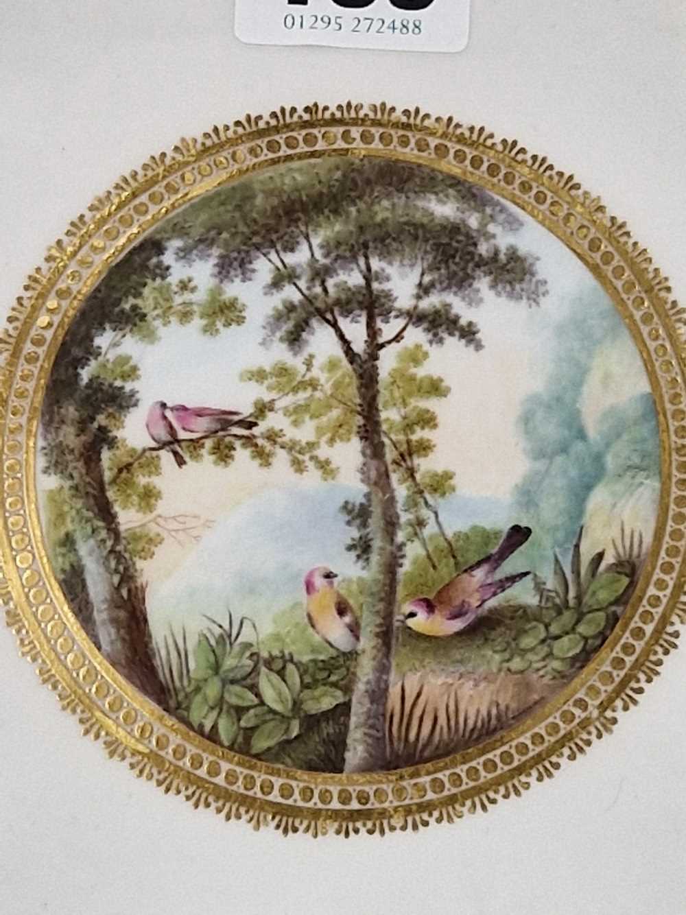 A Derby plate painted by George Robertson with birds in a landscape within a gilt wavy edged rim, - Image 10 of 12