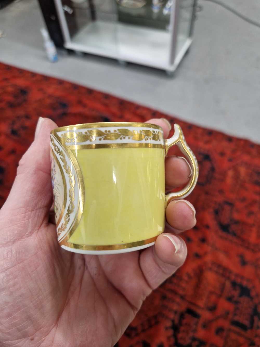 A Derby yellow ground coffee can and saucer, the former painted with a roundel of flowers, puce - Image 8 of 13