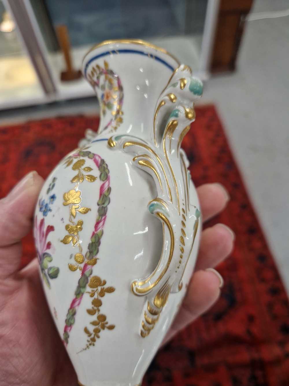 A Derby two handled vase painted with heart-shaped reserves of flowers, the foot with a brown - Image 6 of 13