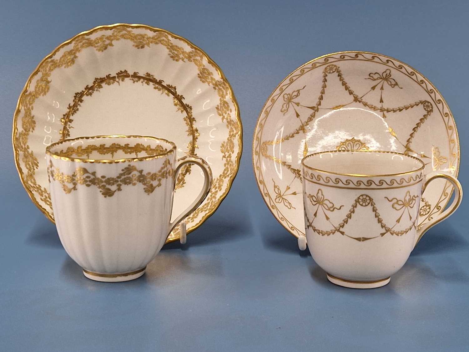 A Derby coffee cup and saucer gilt with swags, blue marks together with a ribbed coffee cup and - Image 2 of 2