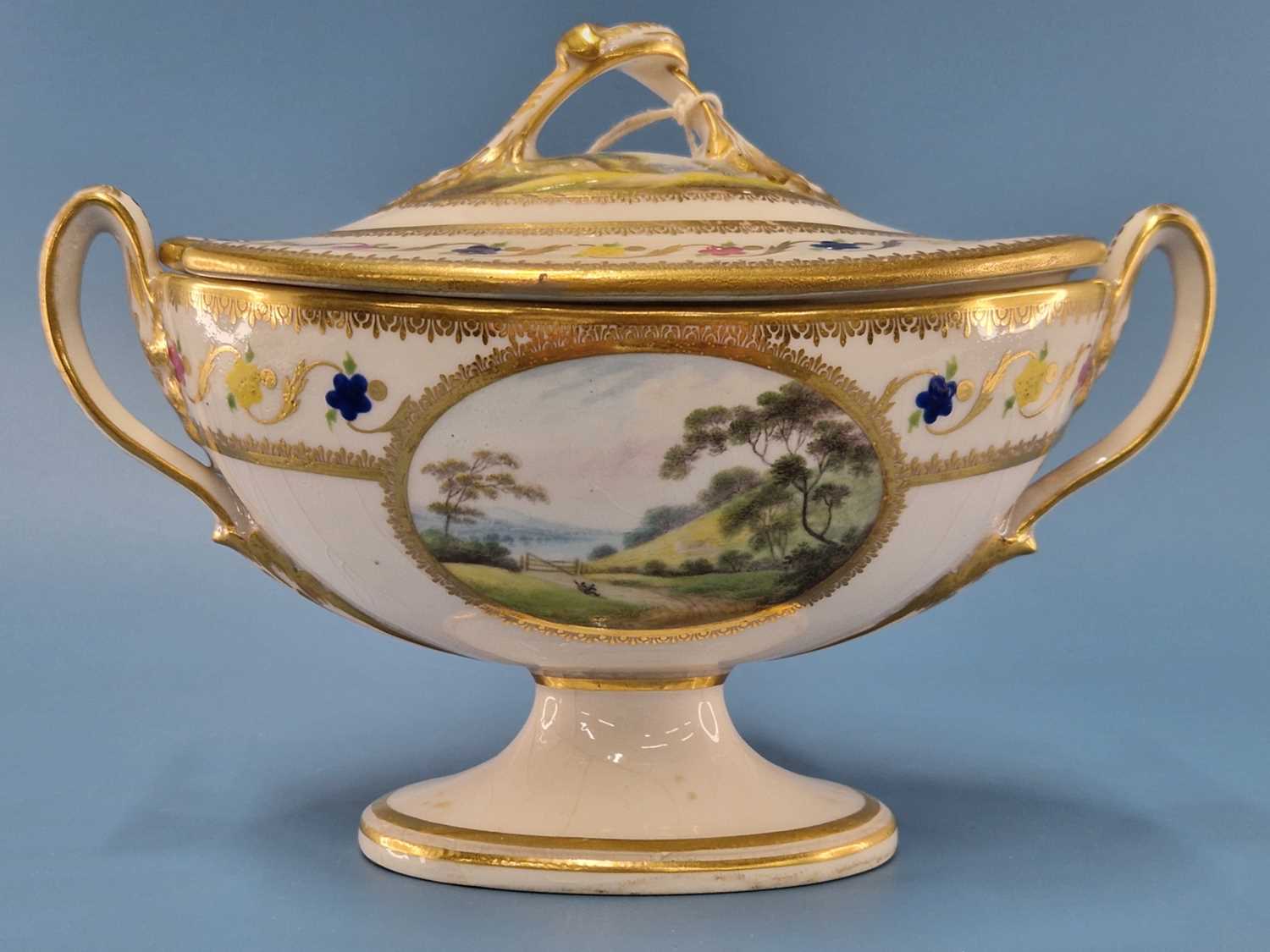 A Derby sauce tureen and cover painted with views named Near Foremark, Derbyshire and On the River