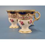 Two Derby ice cups painted with rinceaux of roses and other flowers by William Billingsley below