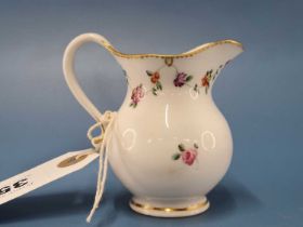 A Chelsea Derby baluster jug painted with a floral chain below the gilt dentil rim line, gilt