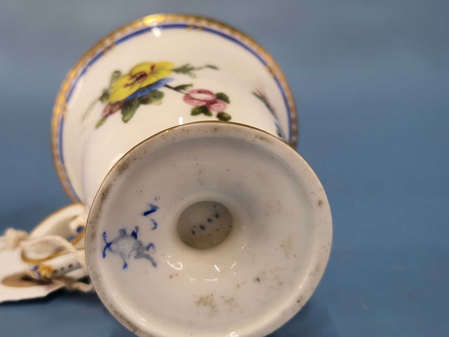 A Sevres ice cup painted with a blue line and flower sprays below a gilt dentil rim line The - Image 4 of 6