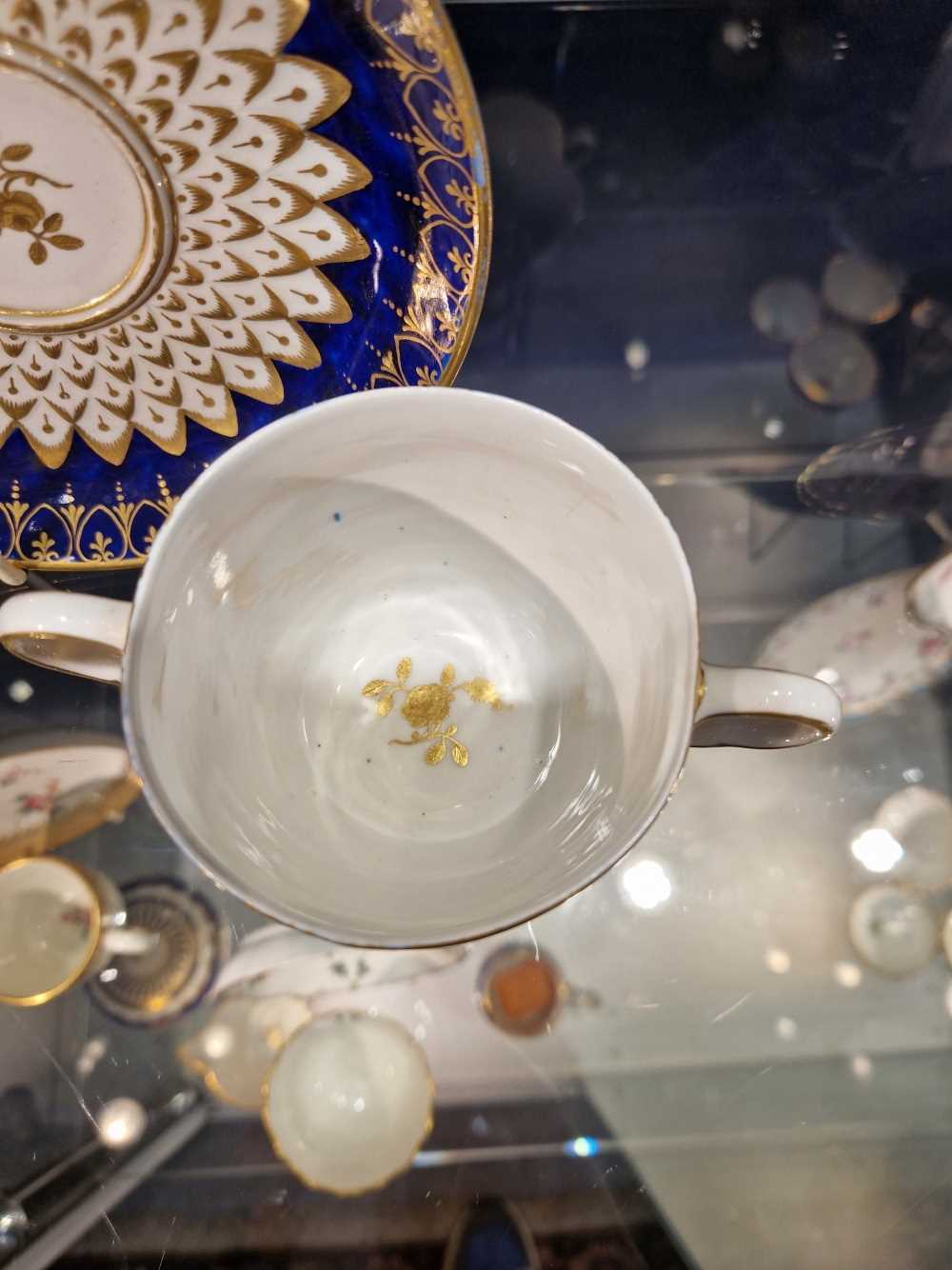 A Derby two handled cup, cover and saucer with royal blue rims enclosing gilt and moulded - Image 5 of 8