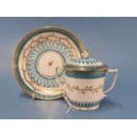 A Chelsea Derby two handled cup, cover and saucer decorated in turquoise and gilt possibly painted