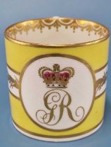 A Derby yellow banded coffee can painted with a crowned GR roundel, puce mark, RF 77 The handle