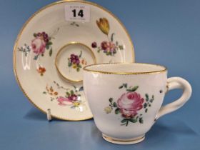A Chelsea Derby coffee cup and trembleuse saucer, each painted with three sprays of flowers within