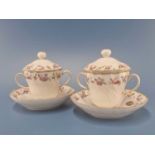 A pair of Derby two handled cups, covers and stands, wheat ear moulded and painted with chains of