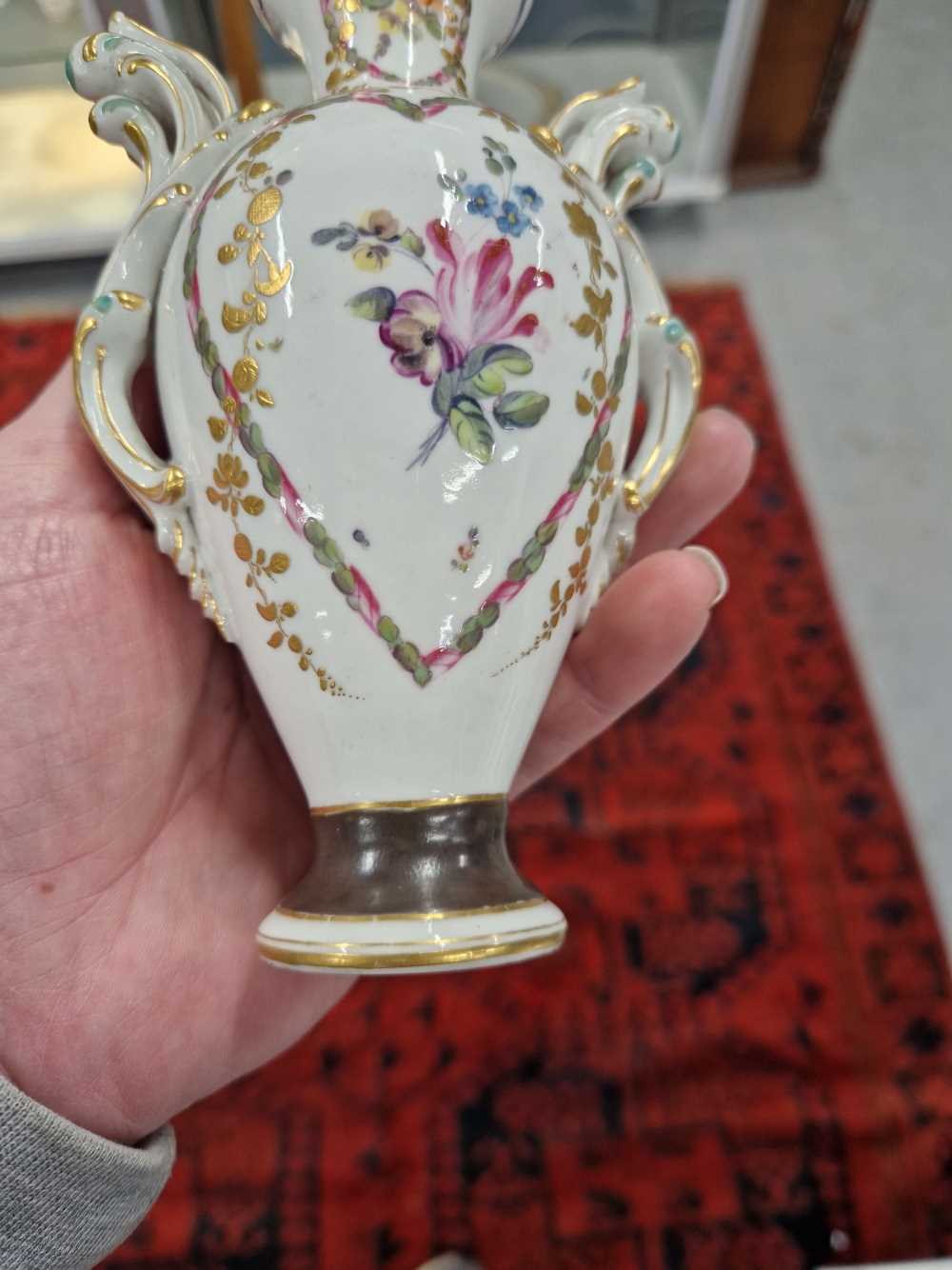 A Derby two handled vase painted with heart-shaped reserves of flowers, the foot with a brown - Image 4 of 13