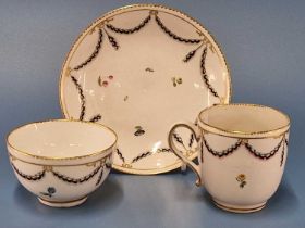 A Chelsea Derby trio painted with laurel swags within gilt dentil rim lines, gilt marks, RF 21 Minor