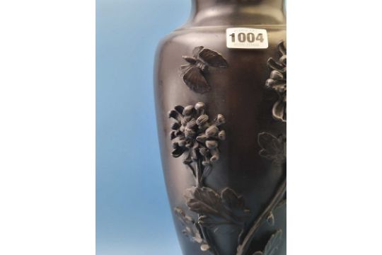 A Japanese bronze baluster vase with two chrysanthemum blooms and a butterfly in relief to one side. - Image 2 of 5