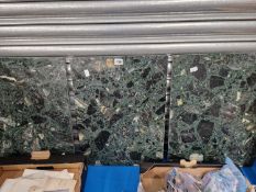 Three green and black mottled stone panels, each.   51 x 38cms.