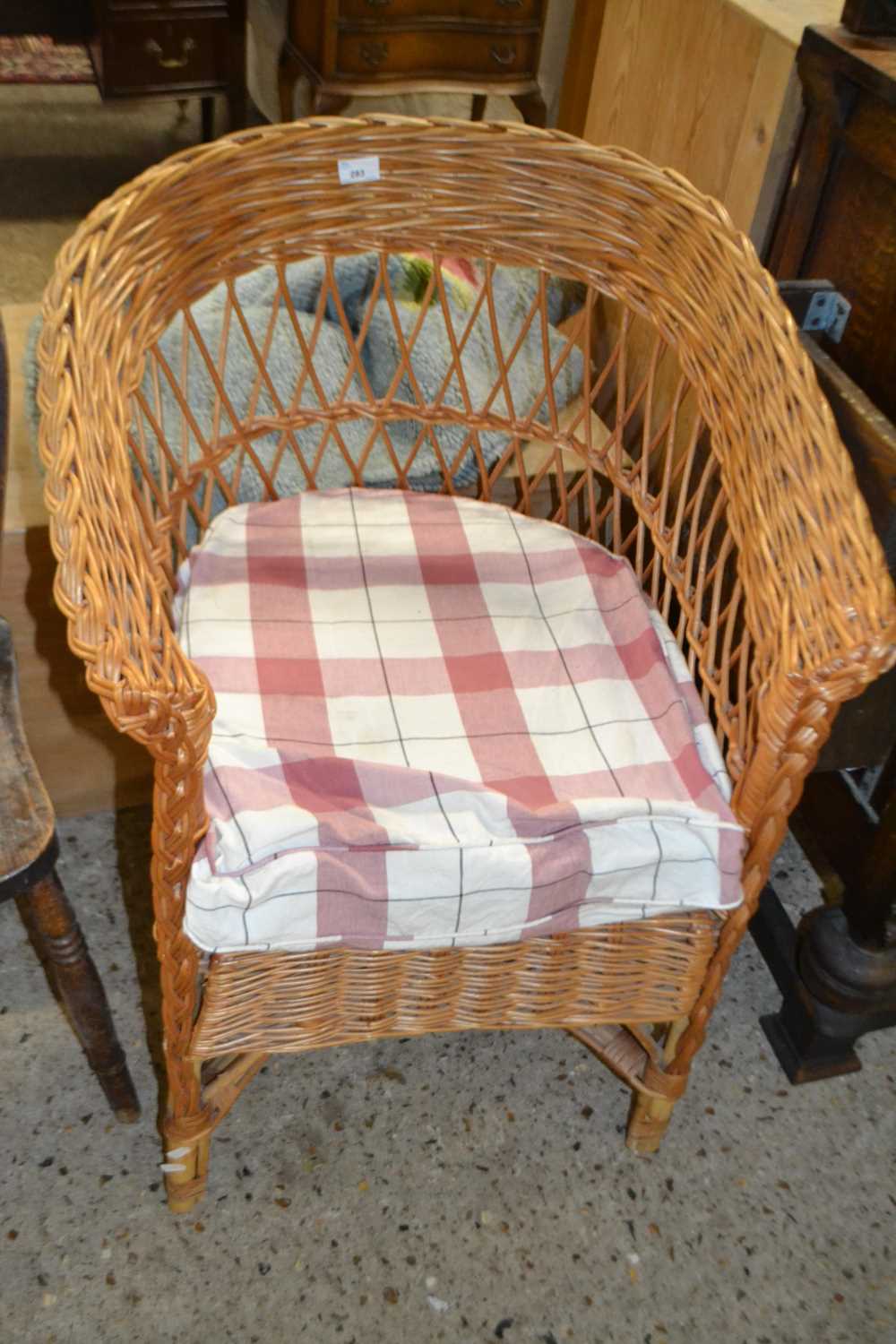 Wicker armchair with seat