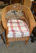 Wicker armchair with seat