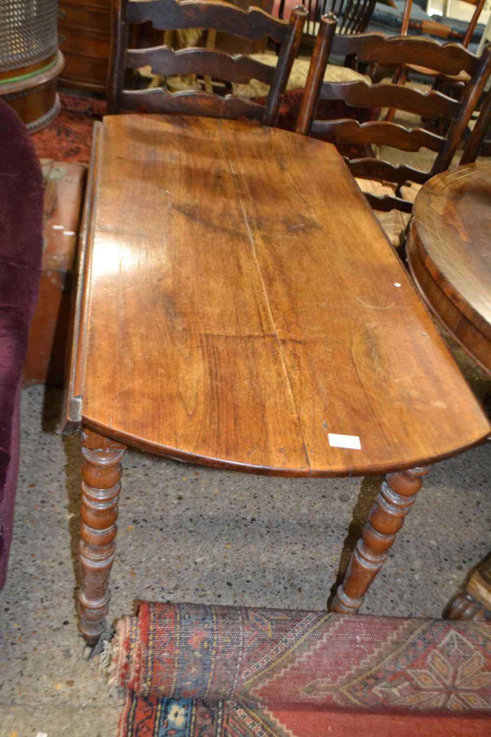 Drop leaf table with turned feet