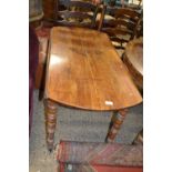 Drop leaf table with turned feet