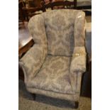 Armchair with floral print decoration