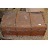 A vintage wooden bound travelling trunk