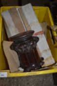 Box containing a small wooden stand